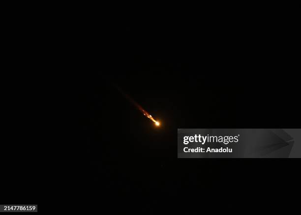 Explosions are seen in the skies over the Ramallah following the Iran's attack on Israel, in Ramallah, West Bank, on April 14, 2024.