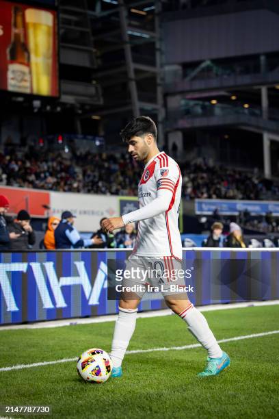 Carles Gil of New England Revolution goes to take a corner kick during the second half of the Major League Soccer match against New York City at...
