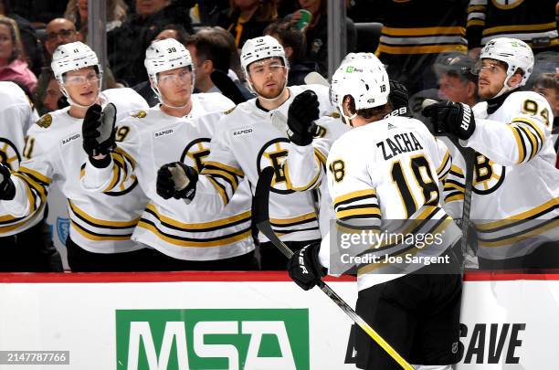 Pavel Zacha of the Boston Bruins celebrates his second period goal against the Pittsburgh Penguins at PPG PAINTS Arena on April 13, 2024 in...