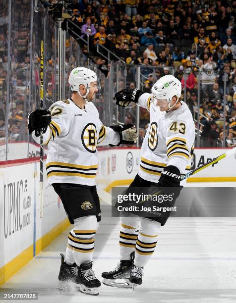 Kevin Shattenkirk of the Boston Bruins celebrates his second period goal against the Pittsburgh Penguins at PPG PAINTS Arena on April 13, 2024 in...