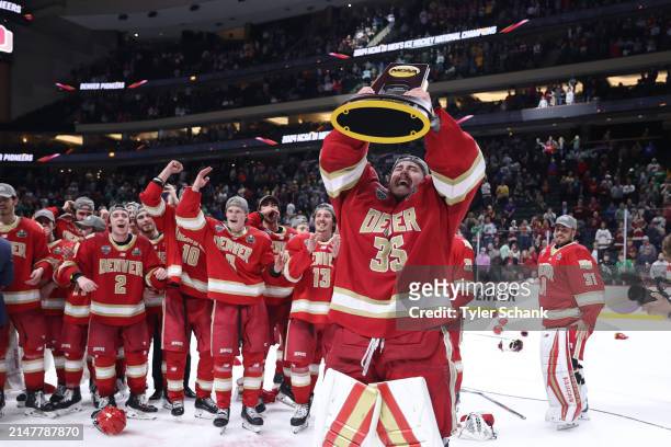 Matt Davis of the Denver Pioneers celebrates after defeating Boston College at the Division I Men's Ice Hockey Championship held at Xcel Energy...