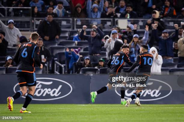 Agustín Ojeda of New York City celebrates his goal with teammate Santiago Rodríguez of New York City during the first half of the Major League Soccer...