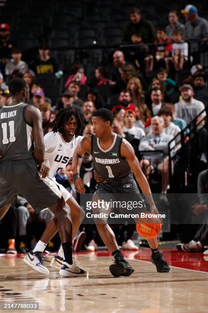 Edgecombe of Team World dribbles the ball during the game against Team USA during the 2024 Nike Hoop Summit on April 13, 2024 at the Moda Center...