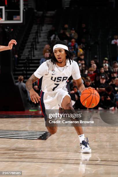 Johnuel Fland of Team USA dribbles the ball during the game against Team World during the 2024 Nike Hoop Summit on April 13, 2024 at the Moda Center...