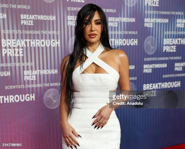 Kim Kardashian poses at the red carpet before the 2024 Breakthrough Prize Awards and Ceremony at the Academy Museum of Motion Pictures in Los...