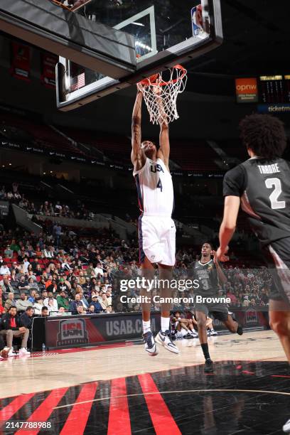 Airious Bailey of Team USA dunks the ball during the game against Team World during the 2024 Nike Hoop Summit on April 13, 2024 at the Moda Center...