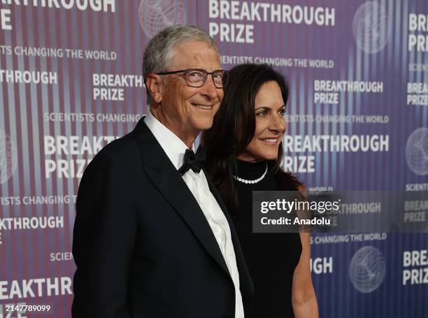 Bill Gates and his partner Paula Hurd pose at the red carpet before the 2024 Breakthrough Prize Awards and Ceremony at the Academy Museum of Motion...