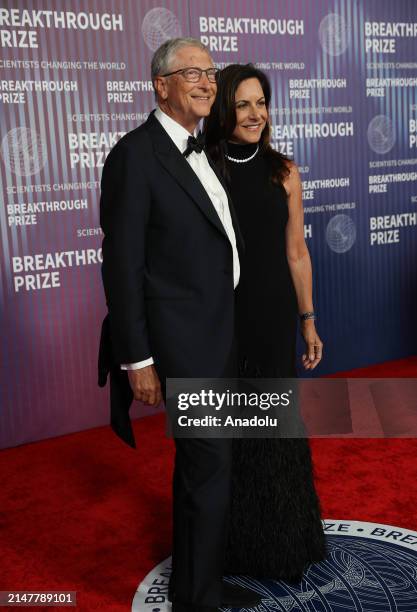 Bill Gates and his partner Paula Hurd pose at the red carpet before the 2024 Breakthrough Prize Awards and Ceremony at the Academy Museum of Motion...