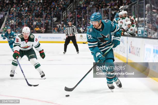 Ryan Carpenter of the San Jose Sharks with the puck during the first period of a game against the Minnesota Wild at SAP Center on April 13, 2024 in...