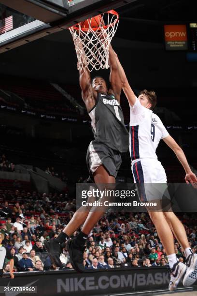 Edgecombe of Team World dunks the ball during the game against Team USA during the 2024 Nike Hoop Summit on April 13, 2024 at the Moda Center Arena...