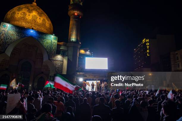 Iranians are celebrating Iran's IRGC UAV and missile attack against Israel in downtown Tehran, Iran, on April 14, 2024. Iran is launching dozens of...