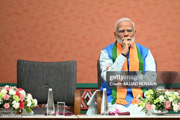 India's Prime Minister Narendra Modi attends the release of the Bharatiya Janata Party's manifesto ahead of country's upcoming general elections, at...