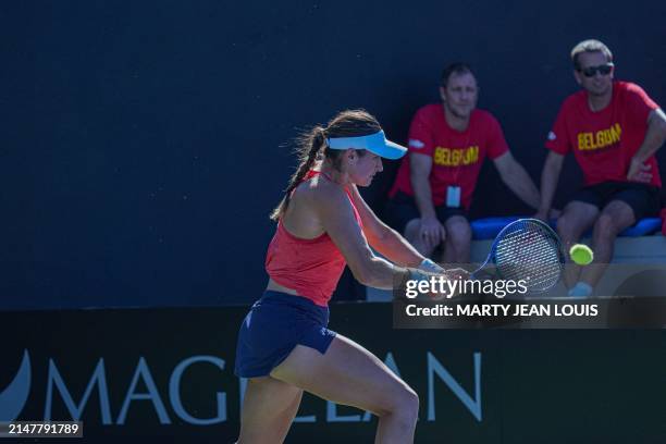 American Caroline Dolehide pictured in action during the fourth match between, a doubles match between American pair Dolehide and Townsend and...