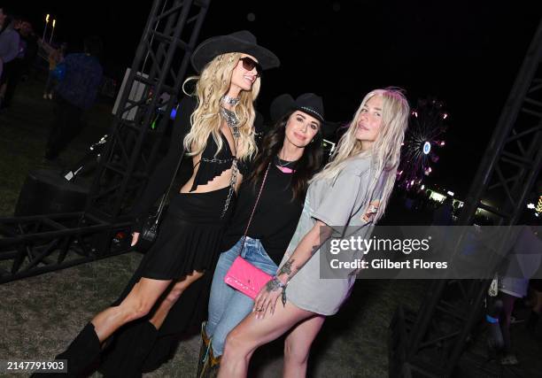 Paris Hilton, Kyle Richards and Kesha at Neon Carnival held during the Coachella Music and Arts Festival on April 14, 2024 in Thermal, California.