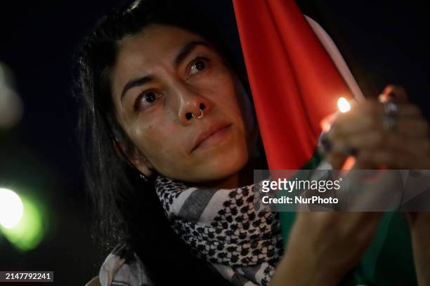Person is demonstrating outside the Palace of Fine Arts in Mexico City, Mexico, on October 7 amid the escalation in the Middle East between Iran and...