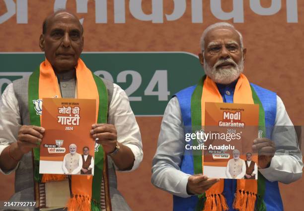Indian Prime Minister Narendra Modi Defence Minister Rajnath Singh release the Bharatiya Janata Party Manifesto ahead of country's upcoming election,...