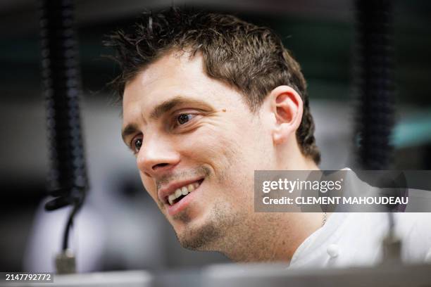 Three Michelin-starred French chef for "La Table du Castellet", Fabien Ferre, looks on in the kitchen of his restaurant of his restaurant in Le...