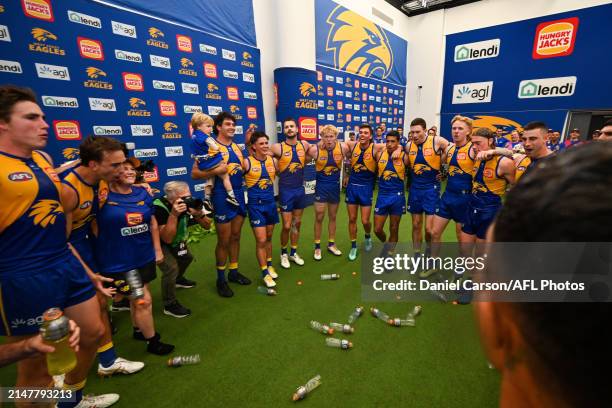 The Eagles sing the team song after the win during the 2024 AFL Round 05 match between the West Coast Eagles and the Richmond Tigers at Optus Stadium...