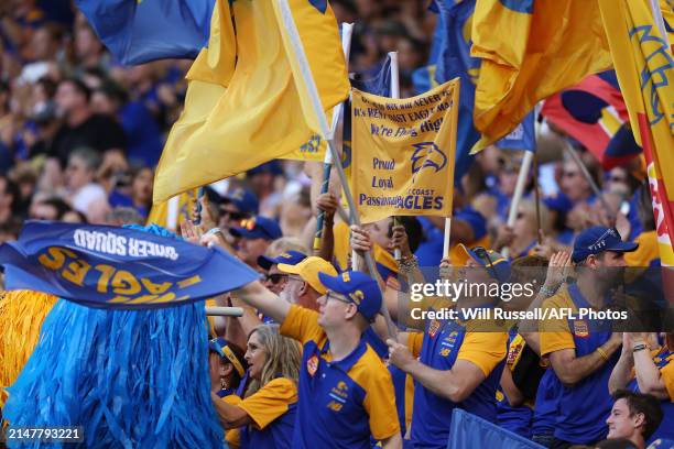 Eagles fans celebrate a goal during the 2024 AFL Round 05 match between the West Coast Eagles and the Richmond Tigers at Optus Stadium on April 14,...