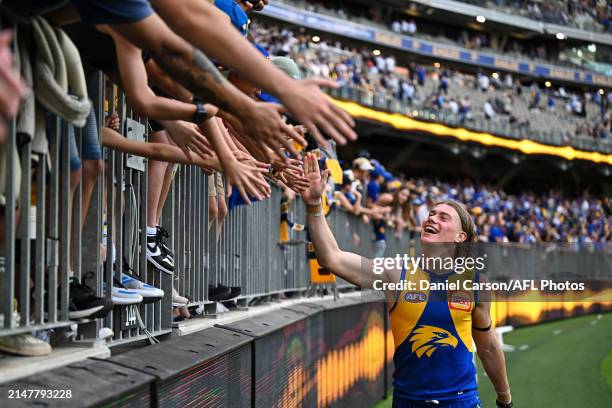 Harley Reid of the Eagles celebrates the win with the fans during the 2024 AFL Round 05 match between the West Coast Eagles and the Richmond Tigers...