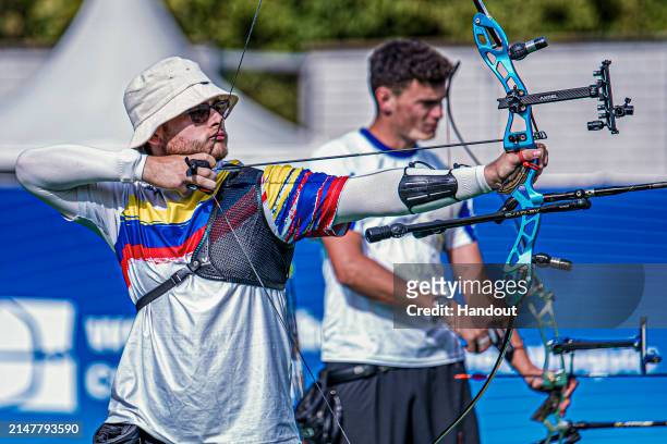 In this handout image provided by the World Archery Federation, Santiago Arcila of Colombia during the Men's recurve finals during the Paris 2024...