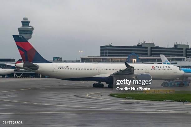 Delta Air Lines Airbus A330-900neo wide body passenger aircraft spotted while towed in Amsterdam Schiphol Airport AMS EHAM with the air traffic...