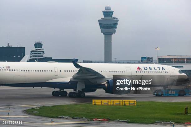 Delta Air Lines Airbus A330-900neo wide body passenger aircraft spotted while towed in Amsterdam Schiphol Airport AMS EHAM with the air traffic...