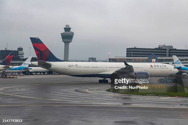 Delta Air Lines Airbus A330-900neo wide body passenger aircraft spotted while towed in Amsterdam Schiphol Airport AMS EHAM with the air traffic...