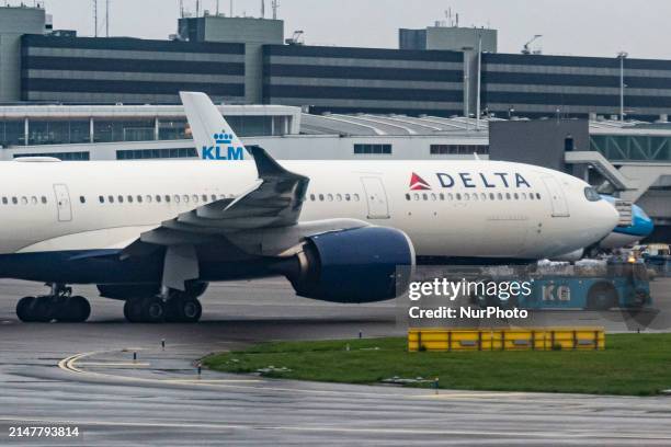 Delta Air Lines Airbus A330-900neo wide body passenger aircraft spotted while towed in Amsterdam Schiphol Airport AMS EHAM with the air traffic...