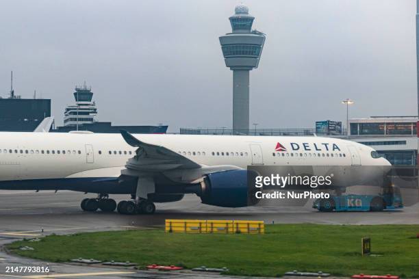 Delta Air Lines Airbus A330-900neo wide body passenger aircraft spotted while towed in Amsterdam Schiphol Airport AMS EHAM with the air traffic...