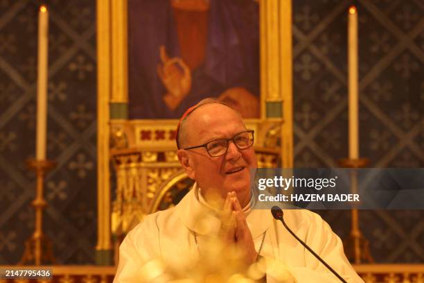 Cardinal Timothy Dolan, the Roman Catholic Archbishop of New York, leads a mass at the Latin Parish Church in Beit Jala, near Bethlehem in the...