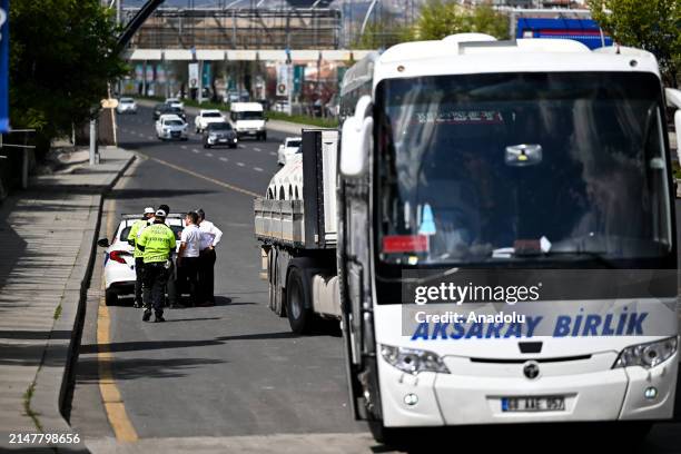 Traffic police are on their duties at checkpoints at the entrances of the city during the last day of Eid al-Fitr holiday in Ankara, Turkiye on April...