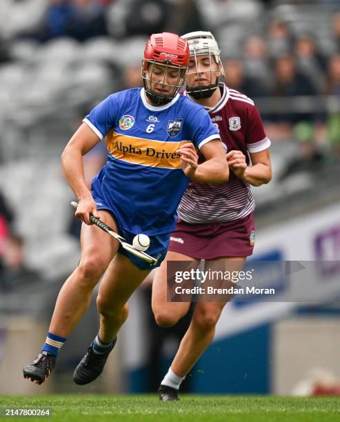 Dublin , Ireland - 14 April 2024; Karen Kennedy of Tipperary in action against Ally Hesnan of Galway during the Very Camogie League Division 1A Final...