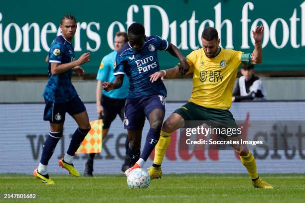 Yankuba Minteh of Feyenoord, Ivo Pinto of Fortuna Sittard during the Dutch Eredivisie match between Fortuna Sittard v Feyenoord at the Fortuna...