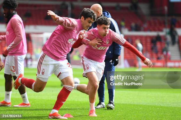 Gio Reyna and Neco Williams of Nottingham Forest are warming up ahead of kick-off during the Premier League match between Nottingham Forest and...