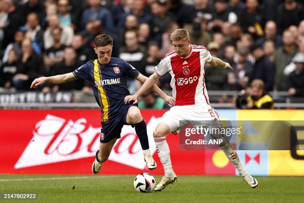 Daan Rots of FC Twente, Kenneth Taylor of Ajax during the Dutch Eredivisie match between Ajax Amsterdam and FC Twente at the Johan Cruijff ArenA on...