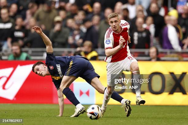 Daan Rots of FC Twente, Kenneth Taylor of Ajax during the Dutch Eredivisie match between Ajax Amsterdam and FC Twente at the Johan Cruijff ArenA on...