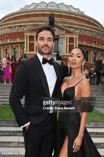 Thom Evans and Nicole Scherzinger attend The Olivier Awards 2024 at Royal Albert Hall on April 14, 2024 in London, England.