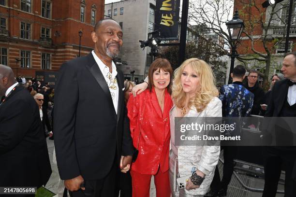 Sir Lenny Henry, Lisa Makin and Producer Sonia Friedman attend The Olivier Awards 2024 at Royal Albert Hall on April 14, 2024 in London, England.