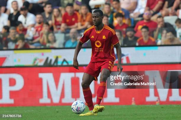 Evan Ndicka of AS Roma in action during the Serie A TIM match between Udinese Calcio and AS Roma at Dacia Arena on April 14, 2024 in Udine, Italy.