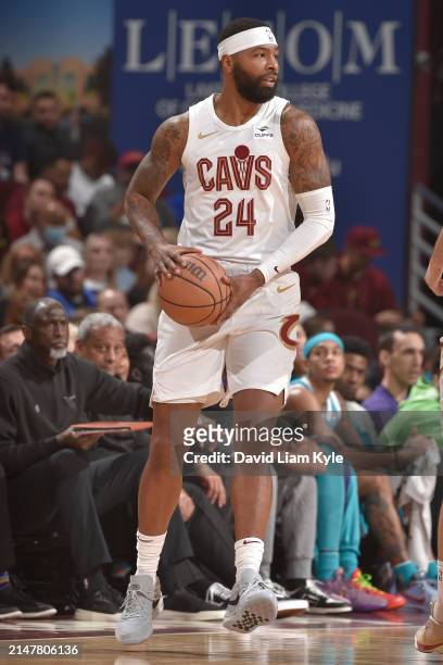 Marcus Morris Sr. #24 of the Cleveland Cavaliers looks to pass the ball during the game against the Charlotte Hornets on April 14, 2024 at Rocket...