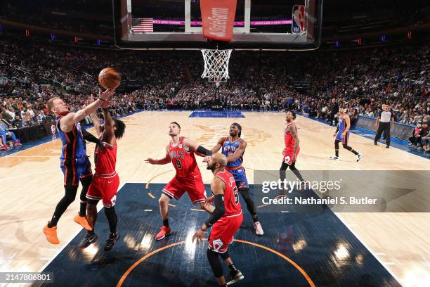 Donte Divincenzo of the New York Knicks shoots the ball during the game against the Chicago Bulls on April 14, 2024 at Madison Square Garden in New...