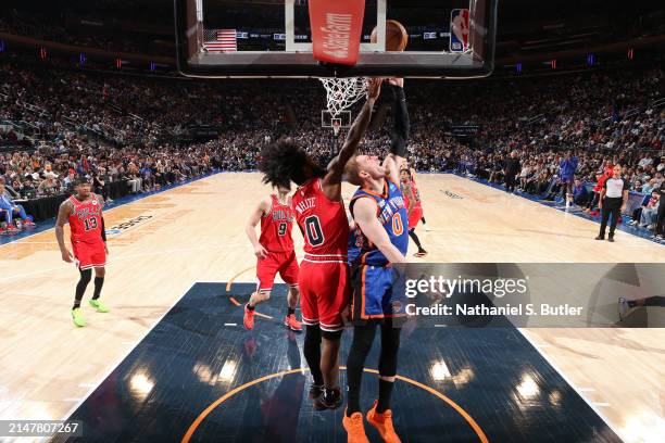 Donte Divincenzo of the New York Knicks grabs a rebound during the game Chicago Bulls on April 14, 2024 at Madison Square Garden in New York City,...