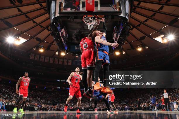 Donte Divincenzo of the New York Knicks shoots the ball during the game against the Chicago Bulls on April 14, 2024 at Madison Square Garden in New...