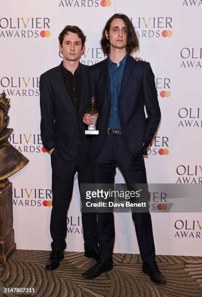 Orlando Phipps and Harrison Phipps, accepting the Best Actress in a Supporting Role award on behalf of their late mother Haydn Gwynne for her role in...