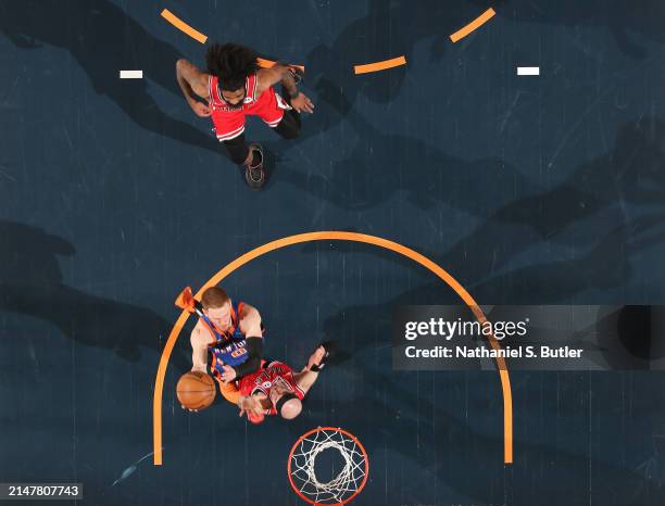 Donte Divincenzo of the New York Knicks shoots the ball during the game against the Chicago Bulls on April 14, 2024 at Madison Square Garden in New...