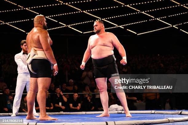 Sumo wrestlers Oosuna Arachi and Soslan Gagloev compete in the final fight during a World Championship Sumo event at The Theater at Madison Square...