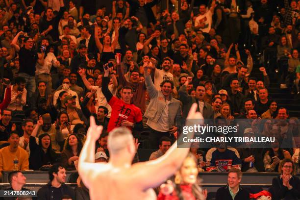 Fans cheer during a fight at a World Championship Sumo event at The Theater at Madison Square Garden in New York City on April 13, 2024. World...