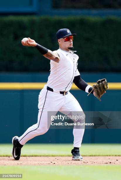 Shortstop Javier Báez of the Detroit Tigers throws out Austin Martin of the Minnesota Twins at first base on a ground ball during the second inning...