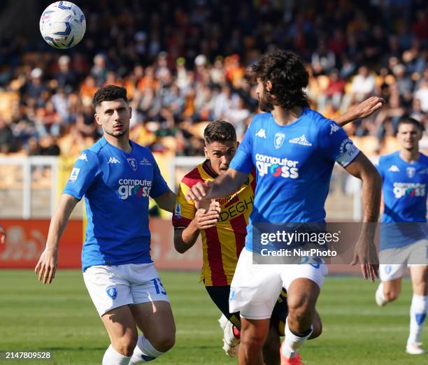 Marin Pongracic of US Lecce is playing during the Serie A TIM match between US Lecce and Empoli FC in Lecce, Italy, on April 13, 2024.
